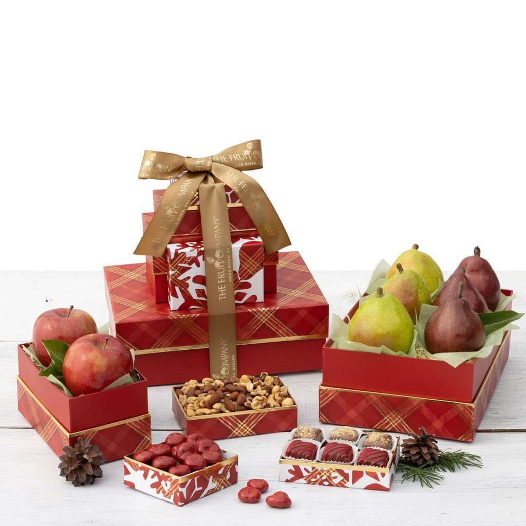 5 red with gold trim and pine-cone themed boxes filled with fruit and treats and gold ribbon