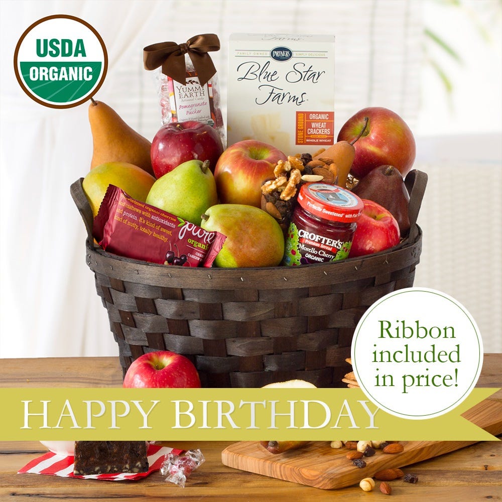 wood woven basket with Organic fruit Organic sweet & savory treats and happy birthday ribbon 